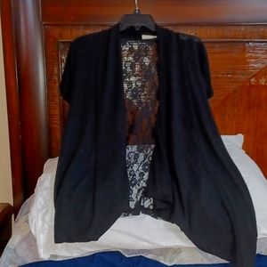 Belle Du Jour Black short sleeved Jesrsy cardigan w/waterfall front/lace back